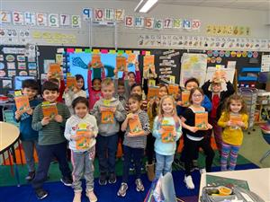 First Grade Class With Book